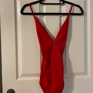 red bodysuit
